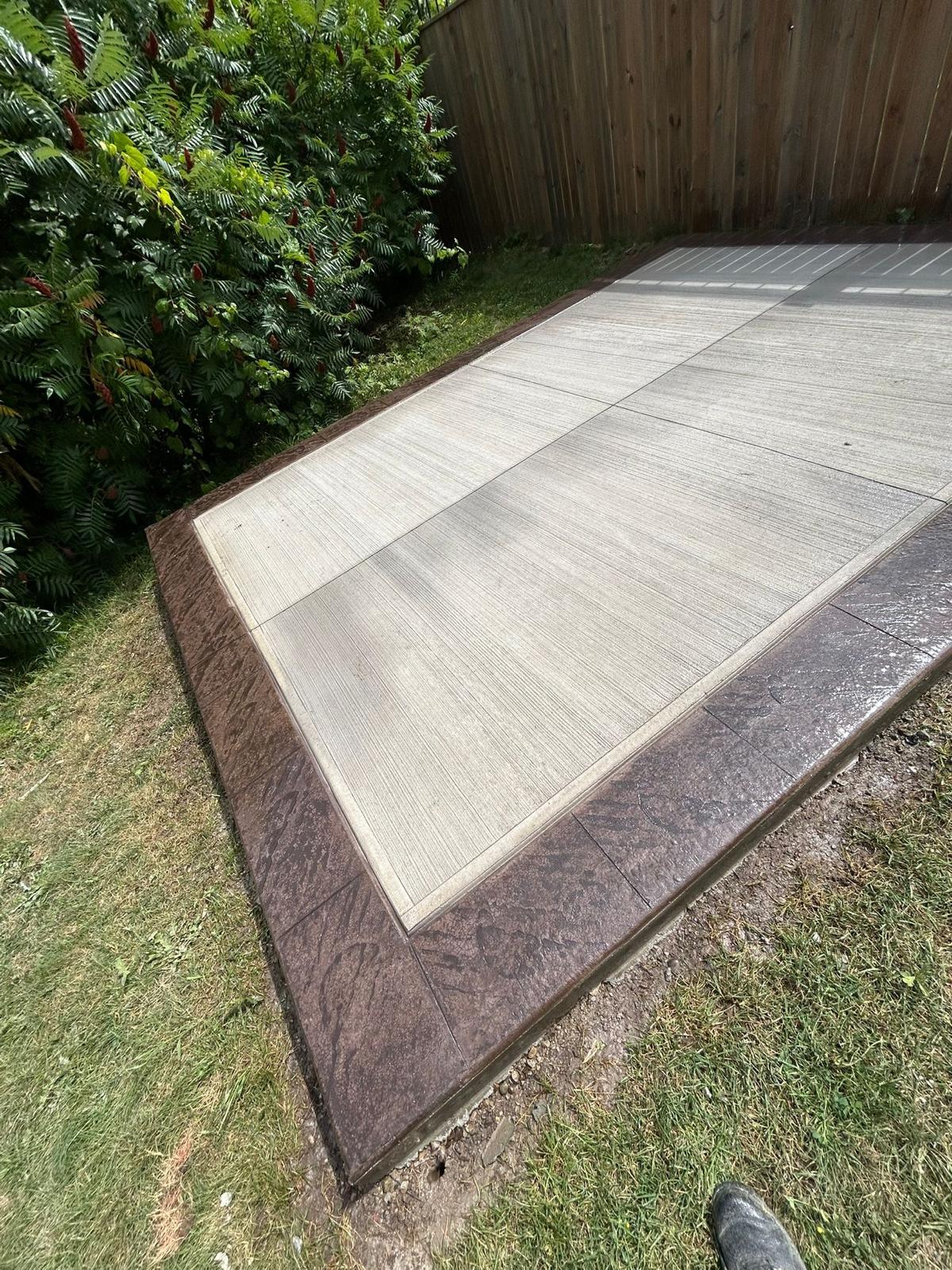 Stamped concrete patio with decorative border — High Spirit Build & Renovations GTA
